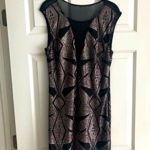 Venus gold sparkles/sheer mesh front and back mini dress.